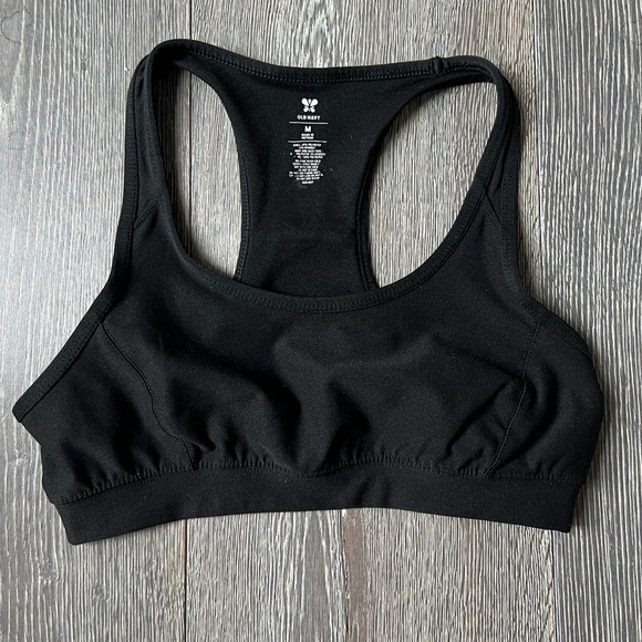 Old Navy black racer back sports bra with reflective tape. Size medium - Picture 2 of 6